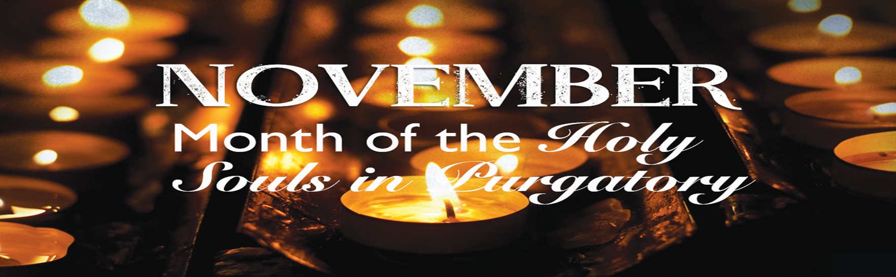 November - Month of the Holy Souls in Purgatory on Background of Lit Candles