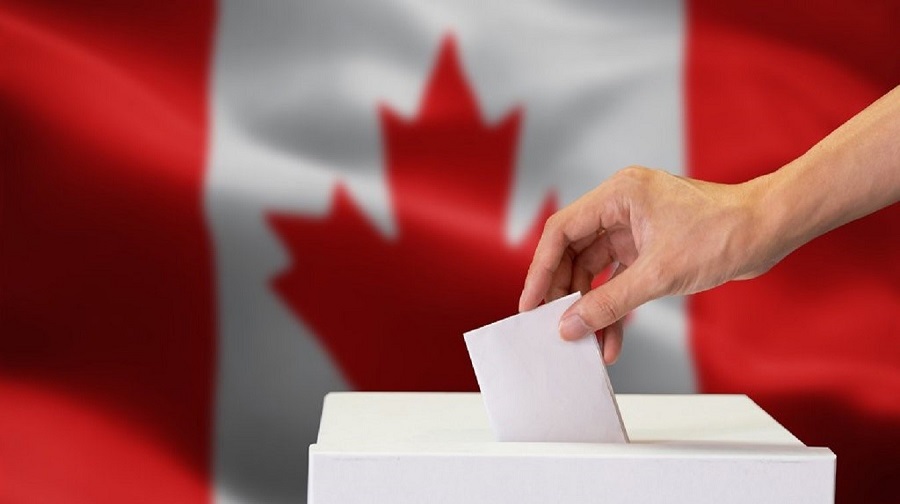 Canada Elections - Flag with Ballot Box in Front and Ballot being placed in Box