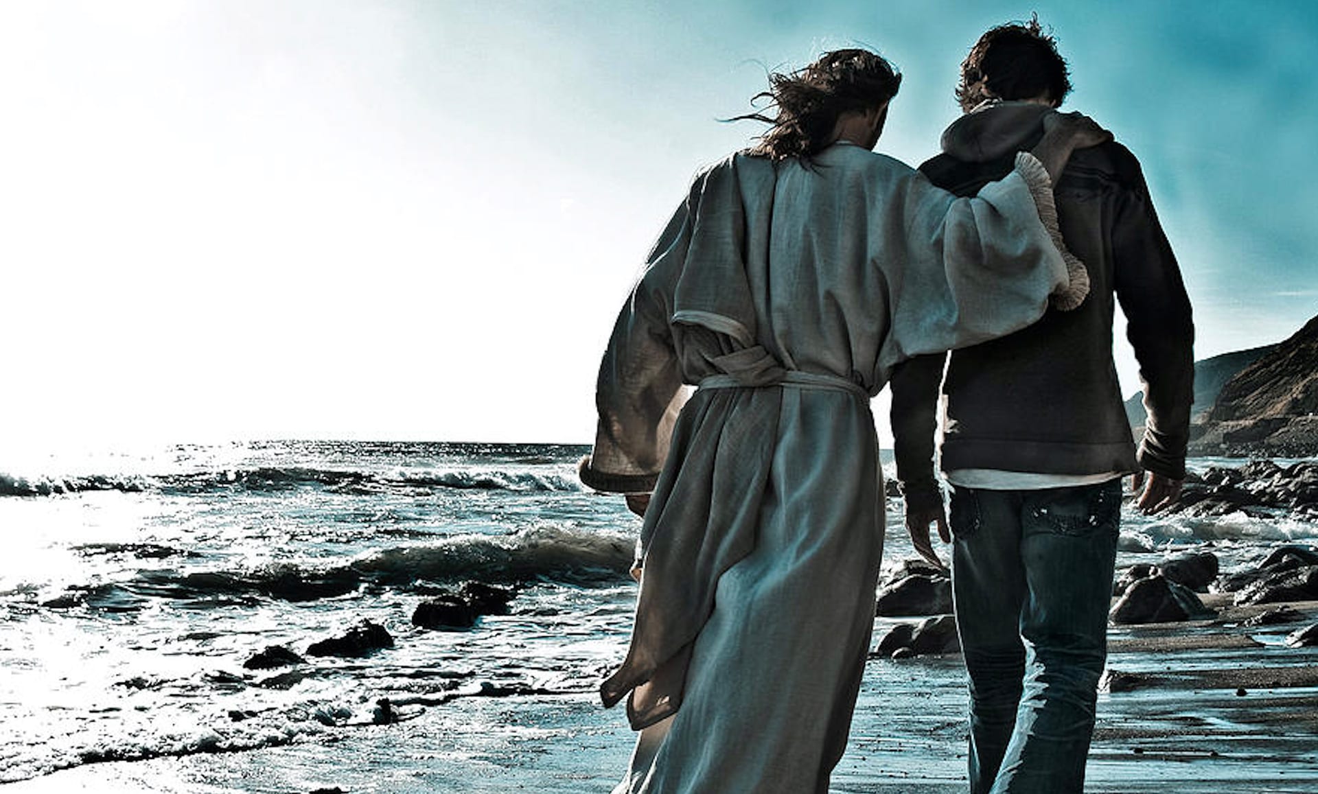 Jesus and Friend Walking on Beach with Jesus' arm over friends shoulder