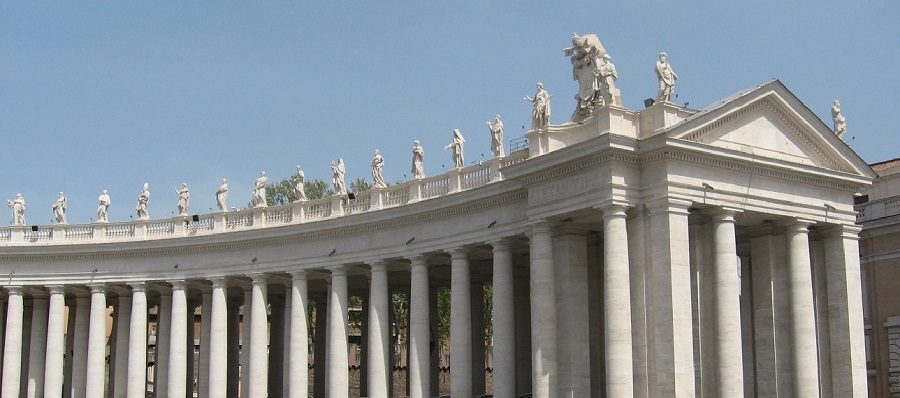 Apostles atop the arms of the Vatican walls