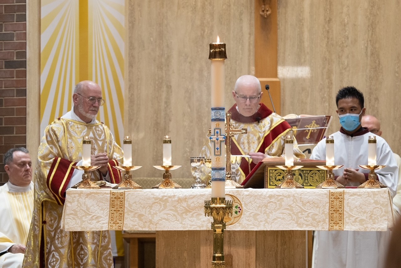 Easter 2023 - Monsignor Zimmer, Deacon Popik and altar boy at Altar