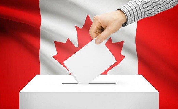 Canada Elections - Flag with Ballot Box in Front and Ballot being placed in Box